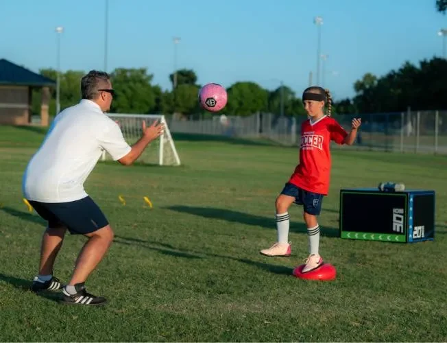 at home private trainer coaching kids soccer drills